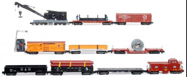 Ten American Flyer postwar S gauge freight cars: Ten American Flyer postwar S gauge freight cars, C6-7. 25016 Southern Pacific lumber car (broken brake wheel mount) with pickup blade and controller, 804 Norfolk and Western (missing one step, repro c