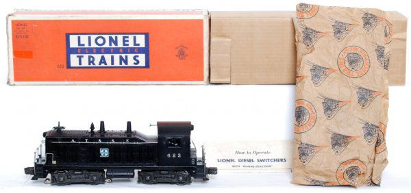 Lionel 623 Santa Fe NW-2 diesel switcher in OB: Lionel postwar O gauge 623 Santa Fe NW-2 diesel switcher in original box with original instructions sheet (623-17 3054 TT), sheet of original wrapping paper (non-striped) and insert, C7. Box has tape