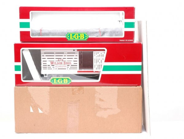 LGB Wilson Bros. Circus 4068-DG 4360-DG MINT OBs: LGB G scale Wilson Bros. Circus 4068-DG Elephant stock car and 4360-DG flatcar in OBs with outer sleeves. The 4068-DG has an outer shipping carton. The cars are C10.
