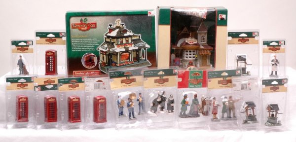 Coventry Cove Porcelain Buildings Accessories MIB: Coventry Cove porcelain lighted West Bend Station and Antique store factory new in OBs. Also included are Coventry Cove accessories including; five telephone booths, Officer & friend, Christmas Puddin