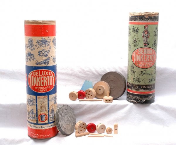 Deluxe Tinkertoy and Senior Tinkertoy Sets: Deluxe Tinkertoy set and Senior Tinkertoy set. Both appear to be complete in original containers. The Senior Tinkertoy set has instruction sheets. Both have some cracking on labels and water staining 