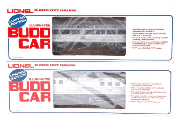 Lionel 8764 8765 B&O Budd Passengers LN OBs: Lionel two illuminated Baltimore & Ohio Budd cars including; 8764 powered passenger and 8765 baggage car dummy in OBs. The 8764 is C8 and the 8765 is C9.