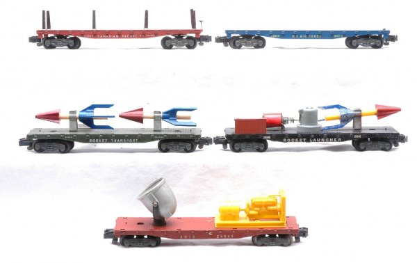 AF five Freights 24549 24553 24558 24574 25045: American Flyer S gauge five freight cars; 24549 Erie floodlight, 24553 rocket transport, 24558 Canadian Pacific flatcar missing tree load, 24574 U S Air Force flatcar missing load and 25045 rocket lau