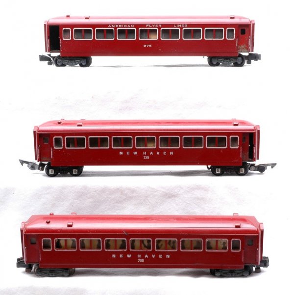 Am Flyer three New Haven 735 735 975 Coaches: American Flyer S gauge three New Haven passenger cars; two maroon painted 735 animated station coaches and a 975 dark red animated station coach, C6.