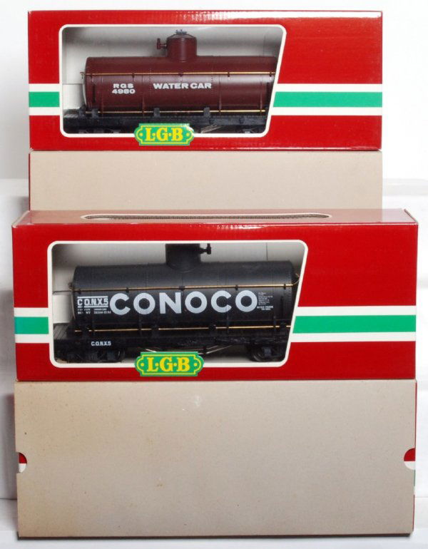 Four LGB G scale tank cars in original boxes: Four LGB G scale tank cars in original boxes, C9-10. 4080 Y 03 RGS water tank, two 4080 Conoco tanks, 4080 Y 04 Shell tank.