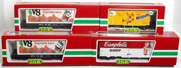 LGB G scale 41850, 41850, 45820, 41911 in OB: LGB G scale 41850 V8 flatcar with container, 41850 V8 flatcar with container, 45820 Nesquik goods/freight car, 41911 CambellÕs soup boxcar, in original boxes, C9-10.