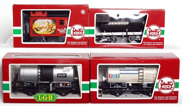 Four LGB G scale freight cars in original boxes: Four LGB G scale freight cars in original boxes, C8-10. 4040C BASF tank, 43403 Theo & Prax tank, 48400 Pennsylvania tank, 47650 Lehmann Wild West Show caboose, two boxes have a price sticker.