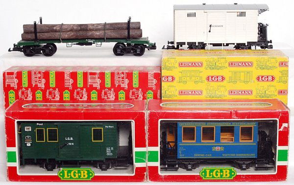 LGB G scale freight and passenger cars in OB: LGB G scale 4031 goods car, 3019N postal car, 3013 OBB Speisewagen and 4066 lumber car, C8-9. Boxes show light wear, price stickers.