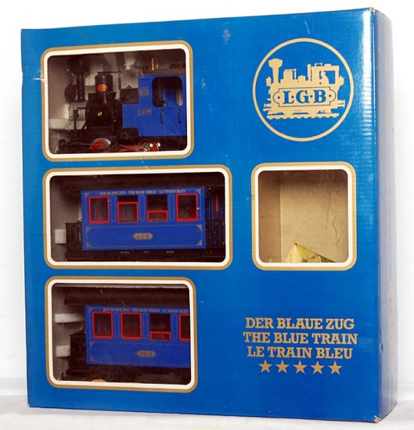 LGB G scale The Blue Train set in OB: LGB G scale The Blue Train set in original box, consisting of loco and two passenger coaches, C7-8. Box shows mild wear.