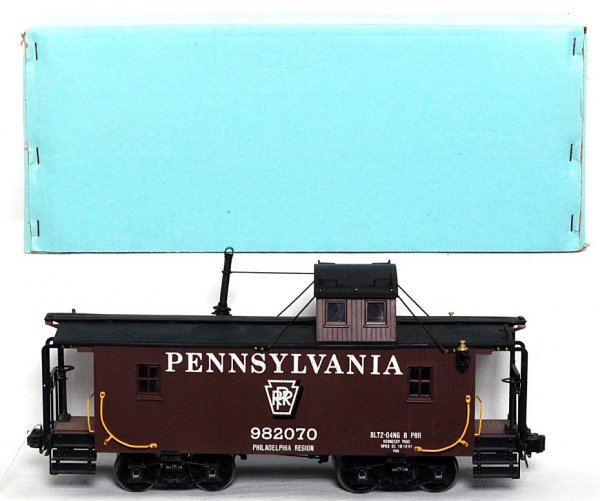 Aster gauge 1 PRR eight wheel caboose in OB: Neat Aster gauge 1 Pennsylvania eight wheel caboose in original box, a little surface rust on three wheels, otherwise C8-9. Aster Hobby Co., Inc. Tokyo Japan.