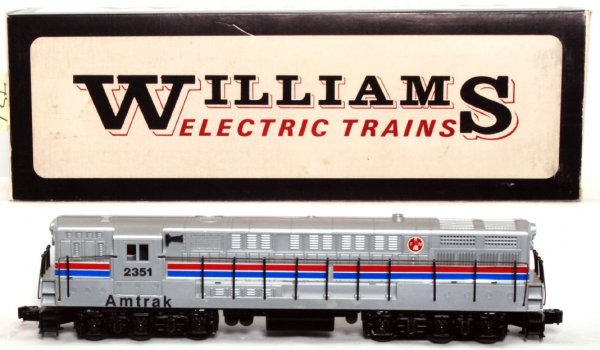 Williams 2351 Amtrak FM Train Master in OB: Williams 2351 Amtrak FM Train Master in original box, cab end of shell has been glue repaired, otherwise train looks C7-8. Box is square and solid but has tear at end flap fold.