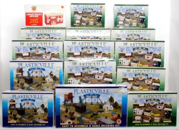 Sixteen Bachmann Plasticville O gauge kits sealed: Sixteen Bachmann Plasticville O gauge kits sealed in original boxes, C10. Some boxes have a price sticker. Two 45607 split level houses, two 45605 diners, two 45601 turnpike interchange, two 45974 ped