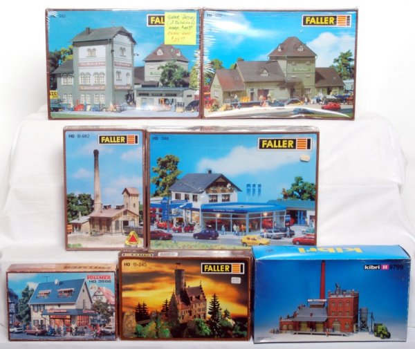 Vollmer, Faller and Kibri HO building kits in OB: Vollmer 3666 biker shop. Kibri 9799 factory. Faller B-245 Lichtenstein castle, B-982 heating and power plant, 953 Otto Moser and Sohn gear factory, 959, ZG Raiffeisen warehouse central cooperative and