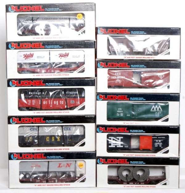 Lionel 19218, 19809, 16510, 16318, 19211, more: Lionel 19218 New Haven boxcar, 19809 Erie Lackawanna operating boxcar 16510 New Haven bay window caboose, 16318 Lionel depressed flatcar, 19211 Vermont Railway boxcar, 16348 Liquified Petroleum tank, 