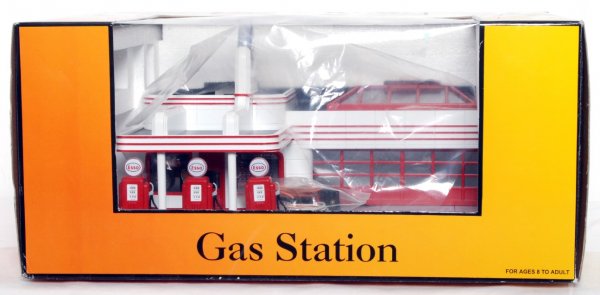 MTH Rail King 30-9106 Esso operating gas station: MTH Rail King 30-9106 Esso operating gas station, looks C9-10. Box is faded, price sticker remnants.