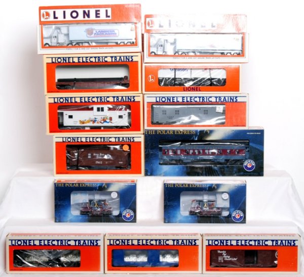 Lionel 28425, 25186, 7518, 52114, 17612, more: Lionel 25186 The Polar Express Hot Chocolate car, two 28425 Polar Express Elf handcars, two 12932 Laimbeer Packaging tractor and trailer, 52114 1997 TTOS NYC flatcar w Gleason and Sasib Railway traile