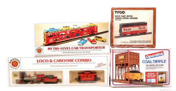 HO Tyco 902 Life-Like 8200 Bachmann 46002 Loco: HO scale Tyco 902 boxcar with chug-chug sound factory sealed in OB. Also included is an Life-Like 8200 operating coal tipple, Bachmann 46002 tri-level car transporter and a Central Pacific loco, tende