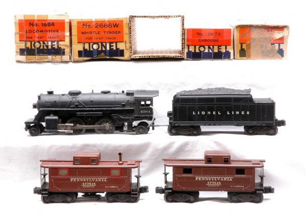 Lionel 1684 Loco 2672 2757 Cabooses 2666W OBs: Lionel prewar O gauge 1684 steam 2-4-2 loco, 2672 caboose, 2757 caboose and 2666W tender in OBs. The tender OB has an original insert. The prewar trucks on the tender and both cabooses have been repla