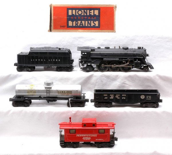 Lionel Set 2101W 224 2466W 2452 2555 2457: Lionel postwar freight set 2101W, circa 1946, containing; 224 steam 2-6-2 loco, 2466W tender, 2452 Pennsylvania gondola, 2555 Sunoco tank and 2457 Pennsylvania caboose. The caboose is in a worn OB. Th