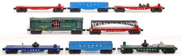 Eight Lionel freight cars, 3356, 3419, 3519, 6803: Eight Lionel postwar freight cars, 3356 Santa Fe horse express, 3419 satellite launching flatcar, 3519 helicopter launching flatcar, 6803 flatcar, 6042 gondola, 6112 gondola, 6819 flatcar and 6825 fla
