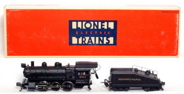 Lionel 18000 Pennsylvania 0-6-0 switcher in OB: Lionel 18000 Pennsylvania 0-6-0 switcher and tender in original box, train looks C9 area, graded C8 due to having been run. Box shows a little light wear, inventory sticker.