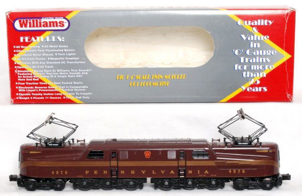 Williams 74401 PRR scale GG-1 w/horn in OB: Williams 74401 Pennsylvania scale Tuscan 5 stripes GG-1 No. 4876 with horn in original box, loco has a loose window pane, C7-8. Box shows light wear.