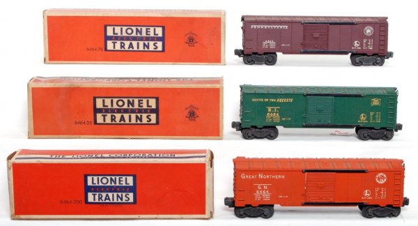 Lionel 6464-200 PRR, 6464-75 RI, 6464-25 GN OB: Lionel 6464-200 Pennsylvania, 6464-75 Rock Island and 6464-25 Great Northern boxcars. Type I bodies. Right now C6 but will clean better. -25 has a detached flap, other two boxes are C7.