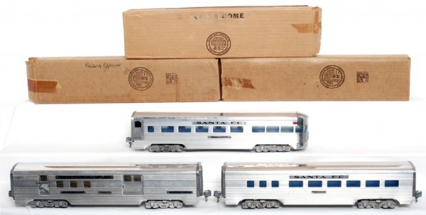 American Model Toys AMT aluminum passengers: American Model Toys AMT aluminum passenger cars including Santa Fe 3407 baggage, Santa Fe Diner and a Santa Fe Indian Arrow. C7-8. All three have outer boxes, no internal boxes.