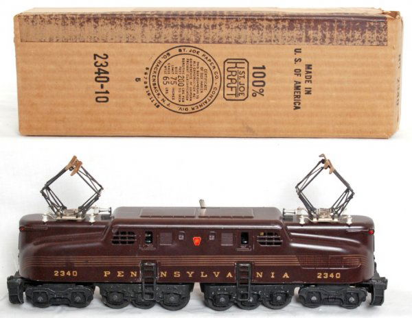 Lionel 2340 tuscan Pennsylvania GG1, OB: Lionel 2340 tuscan Pennsylvania GG1, not perfect quite nice stripes, looks C8 area but does have a couple of very minor paint touch ups. 2340-10 OB is C7, repro insert.