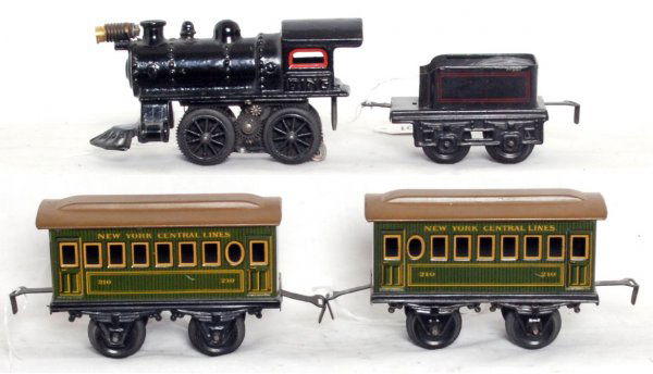 Bing electric 0-4-0 loco, tender two 210 coaches: Bing 0-4-0 electric cast iron loco and tinplate tender with two 210 New York Central coaches, C7 area.