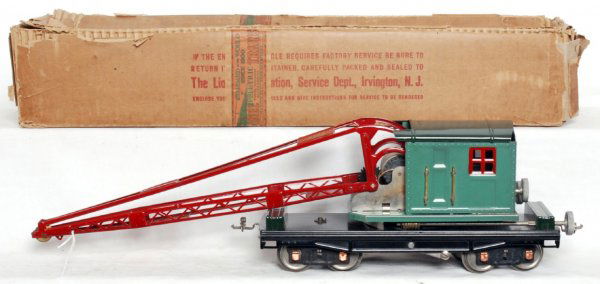 Lionel prewar standard gauge 219 derrick in OB: Lionel prewar standard gauge 219 Peacock blue derrick in original box, very light casting fatigue to smaller diecast gear and missing hook, car looks nice clean C7 area. Box has had some repairs, othe