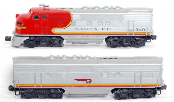 Lionel postwar 2243 Santa Fe F3 A-B units: Lionel postwar 2243 Santa Fe F3 A-B units, trains look C6. A unit has older battery damage that has been cleaned and repainted around fuel tank area.