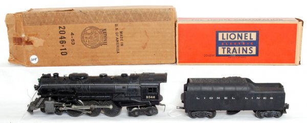 Lionel 2046 loco and 2046W tender in OB: Lionel 2046 loco and 2046W tender in original boxes, trains look C6 area. Loco box has had older tape on it, C7 area. Tender box is missing flaps, has insert.