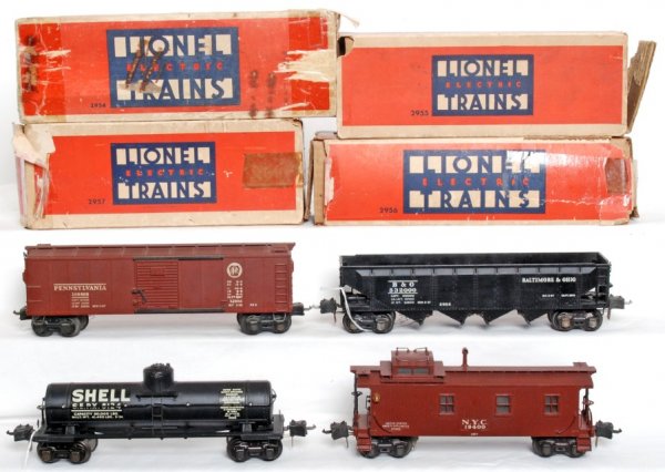 Lionel prewar 2954, 2955, 2956 and 2957 OB: Lionel prewar 2954 Pennsylvania boxcar, 2955 Shell tank car, 2956 Baltimore and Ohio hopper car and a 2957 NYC caboose. Nice C7+ area with no warping. Boxes have wear.