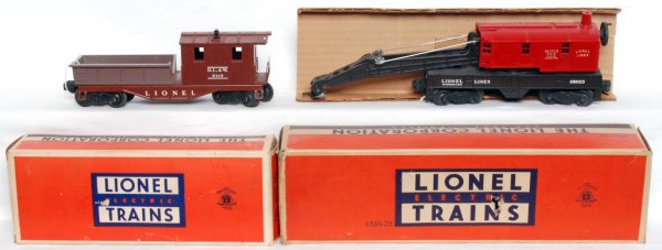 Lionel 6560-25 and 6119-50 caboose in OB: Lionel 6560-25 operating work crane with insert and 6119-50 Delaware, Lackawanna and Western work caboose, in original boxes, tool/equipment bin on caboose has some fading, otherwise cars look C8-9. 6