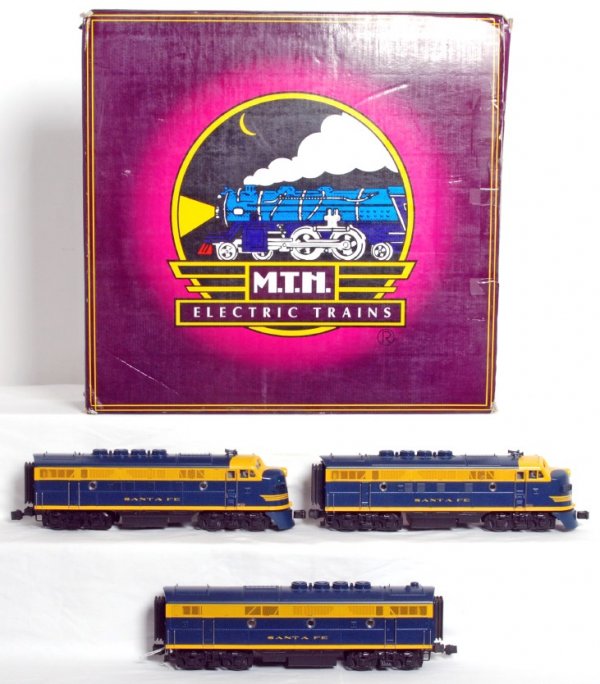 MTH 20-2219-1 Santa Fe F-3 A-B-A diesel set in OB: MTH 20-2219-1 Santa Fe F-3 A-B-A diesel set in original box with ProtoSound, C8 area. Box shows mild wear.