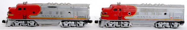 Lionel 2343 Santa Fe F3 A units: Lionel 2343 Santa Fe F3 diesel A units, missing porthole lens, C6 area. Dummy A is yellow mold.