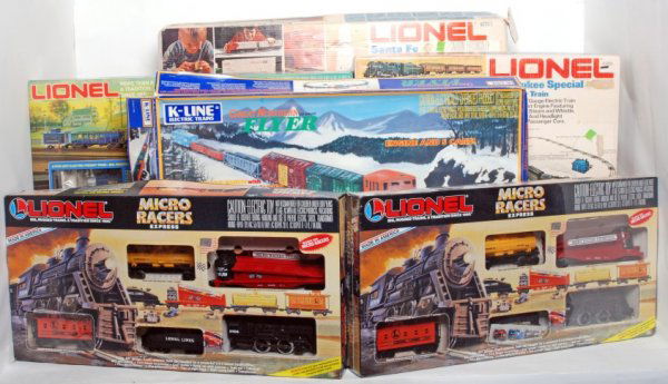 Six Lionel and K-Line boxed freight & pass. sets: Six Lionel and K-Line boxed 027 freight and passenger sets in original boxes, trains look C7-10. K-Line 1702 Great Northern Flyer 027 set. Lionel 1501 Midland Freight 027 set. Lionel 1489 Santa Fe Dou