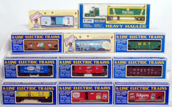 Eighteen K-Line freight cars in original boxes: Eighteen K-Line freight cars in original boxes, C7-9. Boxes show little to mild wear, minor tears, missing cellos, price stickers, etc. K645-5902 Chateau Montelena Wine reefer, K645-5901 Markham Viney