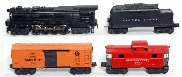 Lionel 2020 turbine, 671W tender, X2454, 2472: Lionel 2020 6-8-6 steam turbine and 671W tender with X2455 PRR Baby Ruth boxcar (broken catwalk end, missing three steps) and 2472 Pennsylvania caboose, C6.