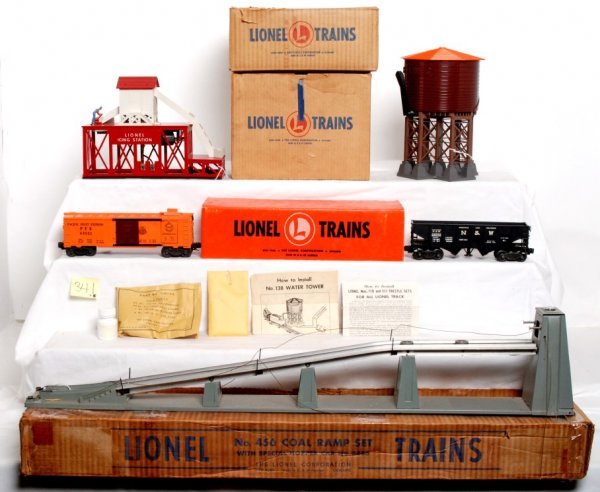 Lionel 352, 138, 110, 456 in original boxes: Lionel 352 ice depot with 6352, 138 water tower with original instructions sheet, 110 trestle set in orange OB, 456 coal loading ramp with 3456, in original boxes. 456, C3-4. 352 C7. 6352 low C7. 110 