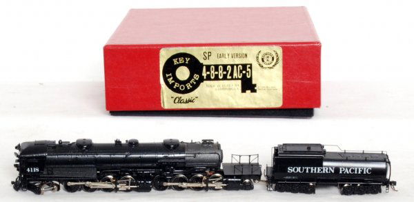 Key Imports brass N scale S.P. AC-5 4-8-8-2: Key Imports, Samhongsa brass N scale Southern Pacific AC-5 early version 4-8-8-2 cab forward steam loco and tender, road number 4102 in original box with good foam. Tender has a loose handrail and a d