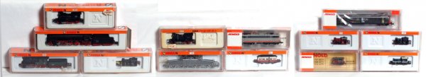 Thirteen Arnold Rapido N scale locos in OB: Thirteen Arnold Rapido N scale European locomotives in original boxes/packages, price/inventory stickers, C8-10. 2073, 2065, 2070, 2060, 2066, 224, 0224, 2243, 2511, 2920, 2486, 2465, 2385.
