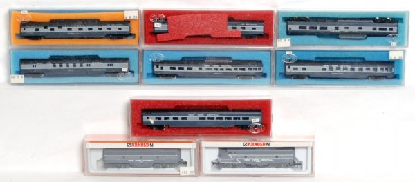Arnold NYC diesels and Con-Cor passenger cars: Two Arnold N scale New York Central diesels, 5005 A unit, 5014 B unit, seven N scale NYC passenger cars, C8-10. All are in the two-tone gray lightening bolt livery. Original boxes have some price/inve