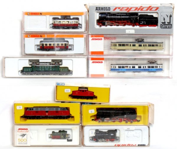 Eleven Arnold-Rapido N scale European trains: Eleven Arnold-Rapido N scale European trains in original boxes, C7-10. Some boxes have price/inventory stickers. 2049, 2972, 2676, 0224, 0202, 2960, 2981, 0203, 0220, 0231, 0221.