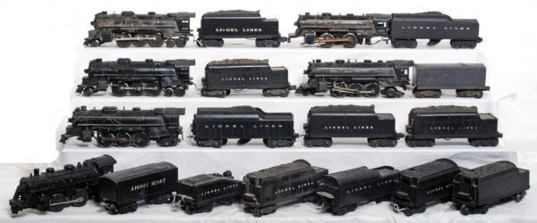 Six Lionel locos and thirteen tenders: Six Lionel locos and thirteen tenders. 2026, 1061, 1666, 1655, 637, 2037, 6466W, Scout tender, 6466W, 2046W, 2046W, 6466W, 221T, 2466W, 6466W, 2466WX, three unnumbered tenders, one is a slope back and