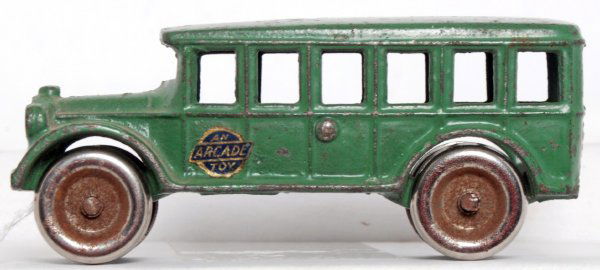 Arcade green bus? with orig. decal, casting 312: Arcade green bus? with original decal, casting number 312. Approximately 5 inches long and 2 inches tall.