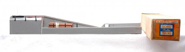 Lionel 364 Lumber Loader Boxed: Lionel postwar 364 lumber loader in OB with instruction sheet. Loader is C7. OB has all flaps attached with label fully intact.