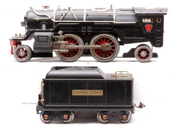 Lionel 385E Steam Loco 390T Tender Restored: Lionel prewar standard gauge 385E black steam 2-4-2 loco with nickel trim. The loco has been re-wheeled and has a reproduction frame. On the top of the loco cab there is a section missing paint. Also