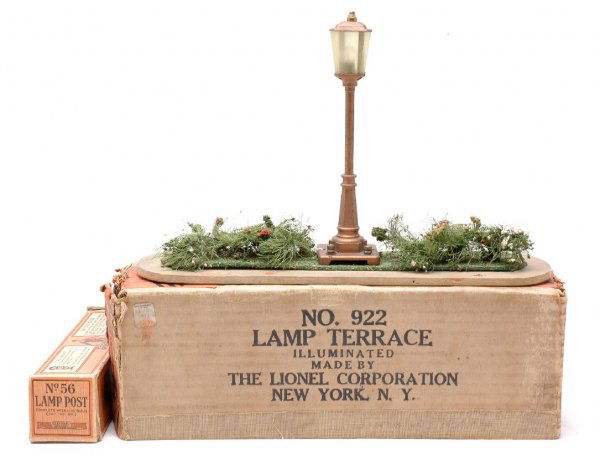 Lionel 922 Lamp Terrace 56 Copper Lamp LN Boxed: Lionel prewar 922 illuminated lamp terrace in OB including; landscaped base and 56 copper lamp post in individual OB. The landscaping on the platform is intact and clean. The base has two holes drille